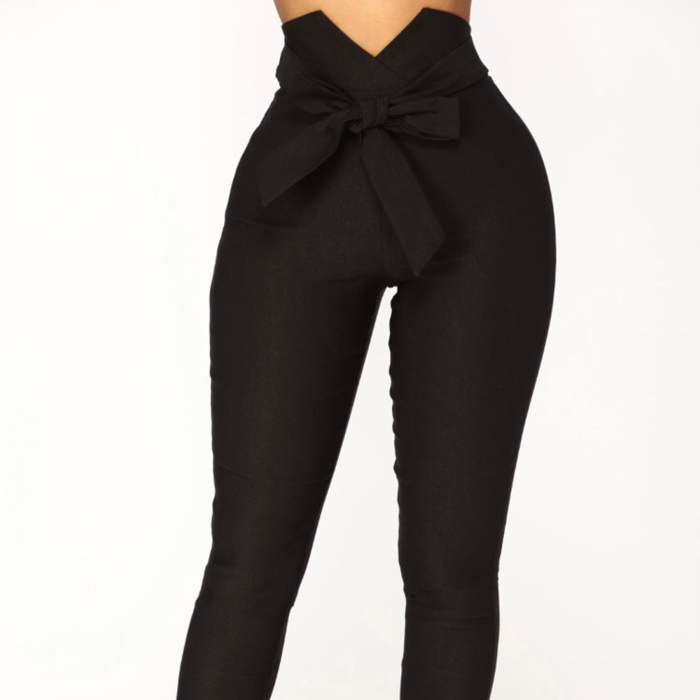 Black High Waist Trouser Style Pants with front bow. Has Stretch